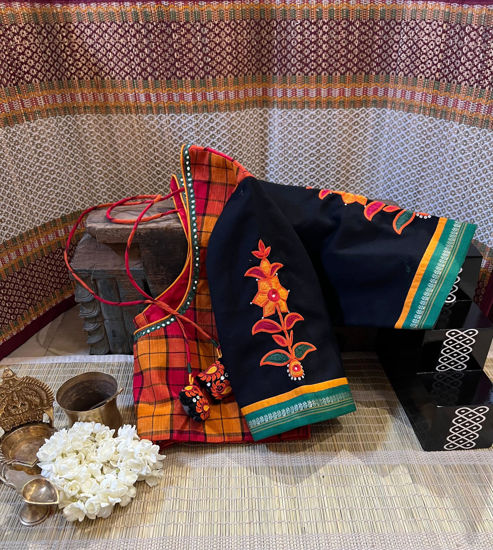 Bold checks. Tribal soul.