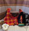 Bold checks. Tribal soul.