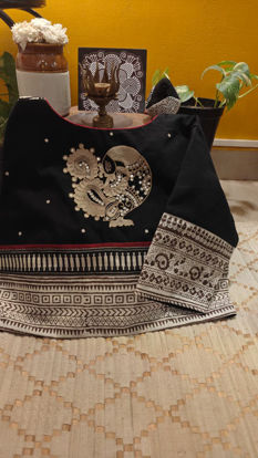 Charcoal & Ivory — Annam Story